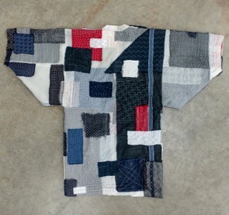 A full spread view of the Birth of Work jacket back side.