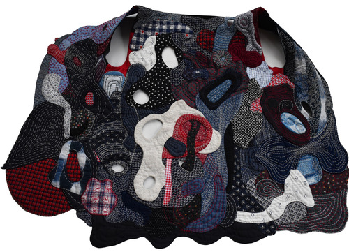 A full spread view of the Coming Together After Loss vest.